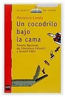 Un cocodrilo bajo la cama